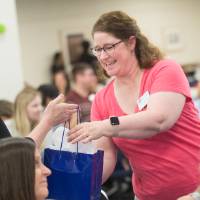 PSS sharing gift bag at luncheon